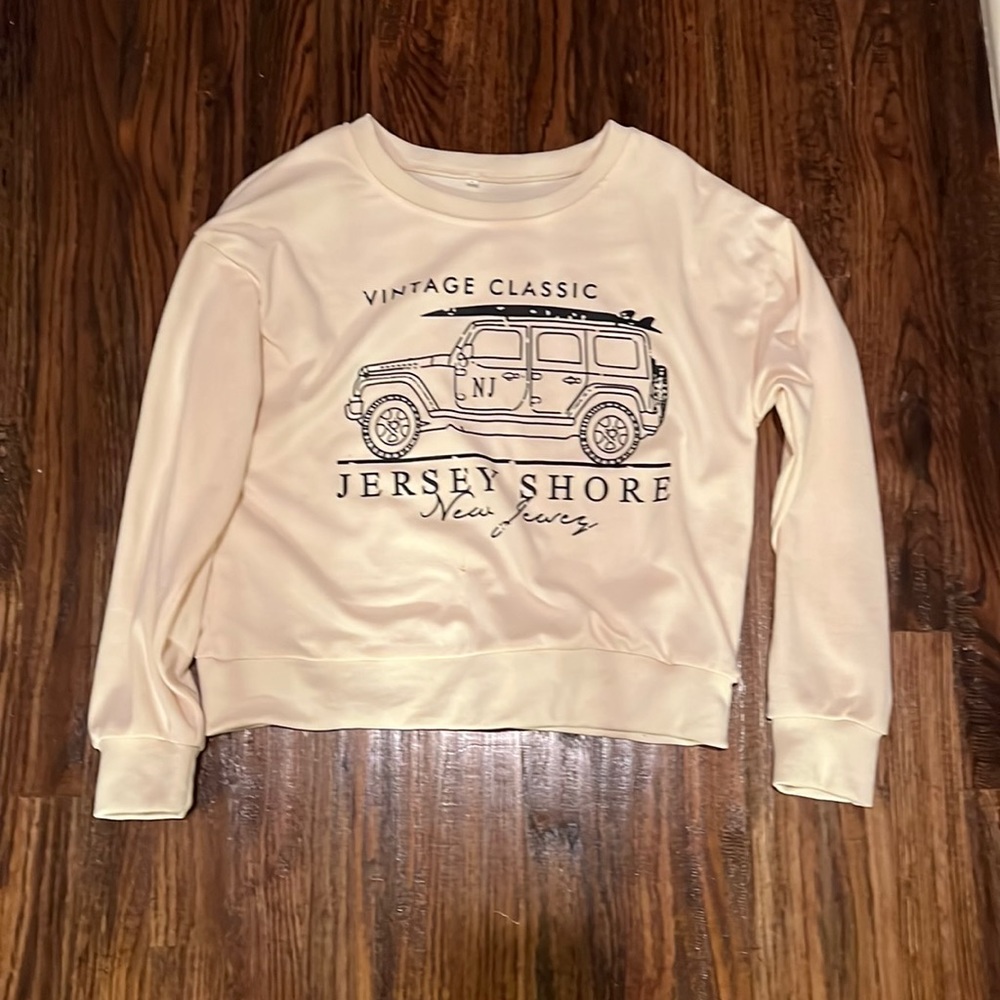 cream jeep crewneck